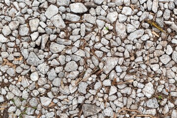 White grey gravel pebble rock texture ground surface abstract background