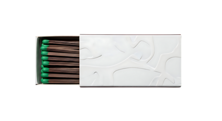 A box of matches with green tips is ready to be used for ignition.