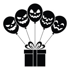 Black halloween jack o lantern balloons tied to gift box © firoj