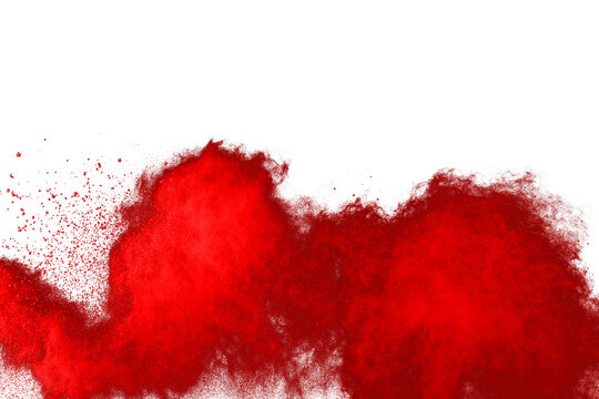 Freeze motion of red powder exploding, isolated on white background. Abstract design of red dust cloud. Particles explosion screen saver, wallpaper