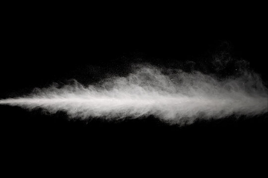White powder explosion on black background. Colored cloud. Colorful dust explode. Paint Holi.