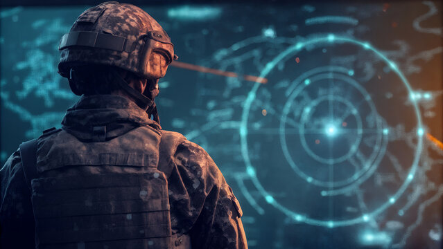 Modern soldier wearing tactical gear standing before advanced holographic HUD interface showing digital maps, cyber defense systems, and high-tech military intelligence visualization