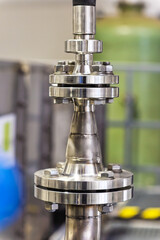 flanged pipe joint assembly made from stainless steel, low flow nozzle installed between two standard flanges