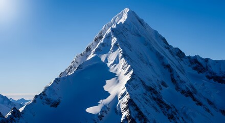 Discover stunning alpine landscapes with this breathtaking mountain peak covered in snow, offering a sense of adventure, challenge, and the awe-inspiring beauty of nature