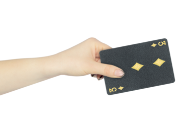 playing card diamonds 3 in hand, outstretched hand with black playing card isolated from background	
