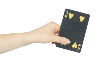 playing card hearts 4 in hand, outstretched hand with black playing card isolated from background