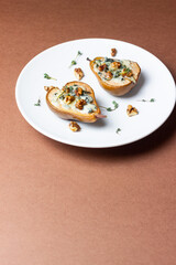 Baked pear with blue cheese, honey, and nuts. Healthy eating. Vegetarian food.