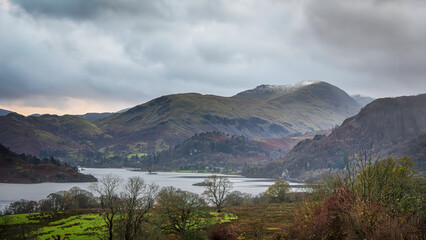 Mist-Covered Hills and Lake on a Rainy Day