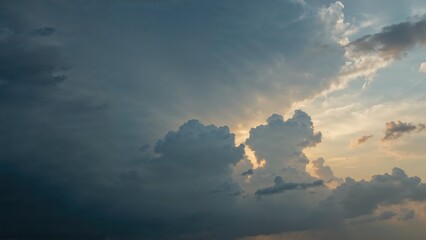 Clouds in the sky during sunset or sunrise with a partly cloudy atmosphere. Weather and sky scene. Nature and atmospheric conditions. The concept of weather and sky observation