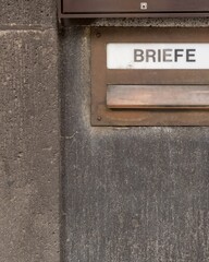 letterbox on an old house wall in germany