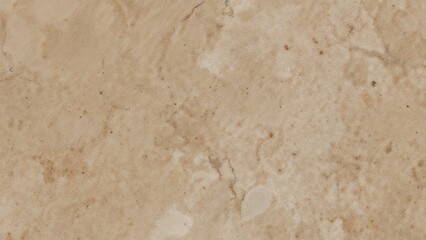 Fototapeta premium A close-up of beige marble or stone surface with natural veining and texture.