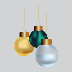 Three shiny christmas balls in gold, green and silver hanging on light gray