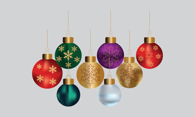 Collection of colorful christmas balls with gold ornament on gray background