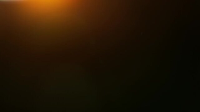 Real Cinematic Light Leak Overlay on Black Background at 1000fps Slow Motion.