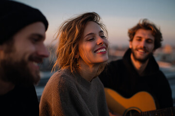 Lifestyle photography of friends playing an acoustic guitar.