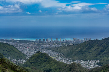 Pālolo Valley with the city skyline of Honolulu. Mauʻumae Ridge Trail (Puʻu Lanipō), Oahu, Hawaii. Koʻolau Range, shield volcano. On the right is Waʻahila Ridge	