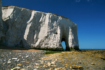 White cliffs arch at Kingsgate Bay Beach, popular tourist destination also known as St Bartholomew's Gate