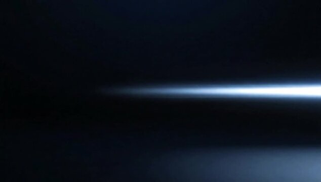 Futuristic blue light streak, an anamorphic lens flare creating a cinematic abstract background for technology or space themes