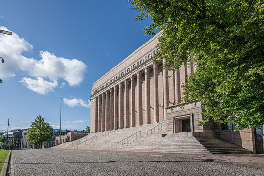 Helsinki, Finland - August 07 2025: Eduskunta Finnish parliament building with tall columns.