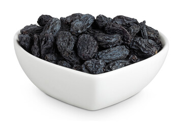 black raisins in ceramic bowl isolated on white background