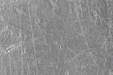 texture of old metal with scratches and cracks. silver plate metal background