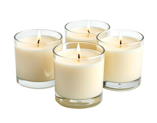 Four burning candles in glass holders