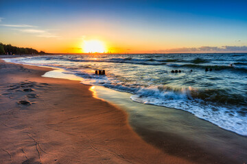Sunset over the Baltic Sea beach in Gorki Zachodnie, Gdansk. Poland