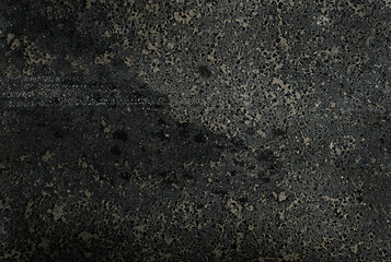 background of damaged asphalt close-up