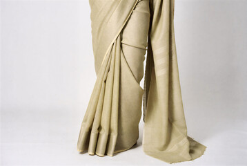 Beige Draped Fabric on Mannequin Legs – Stylish Textile for Fashion Design