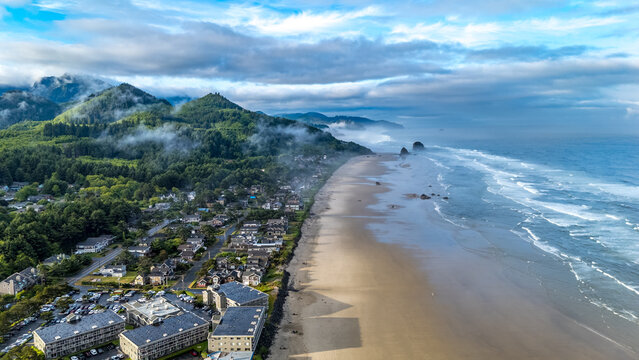 Aerial shot of foggy Cannon Beach at sunrise