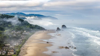 Aerial shot of foggy Cannon Beach at sunrise © Andy Konieczny