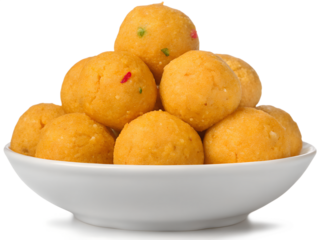 plate of laddu, laddoo or ladoo isolated white background, popular traditional Indian sweet treats made during festivals, religious ceremonies and celebrations 