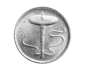 Malaysia five sen coin on a white isolated background