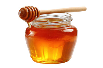 Sweet golden honey in a jar with a wooden dipper ready for drizzling