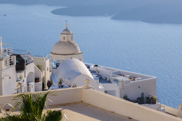 Cityscape of Santorini with Saint Minas Dome and Nea Kameni island