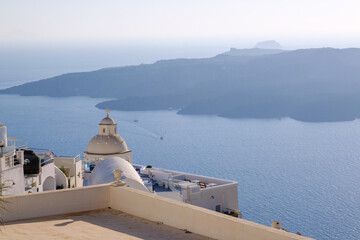 Cityscape of Santorini with Saint Minas Dome and Nea Kameni island