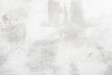 A very light gray concrete surface with minimal imperfections and a clean, bright appearance, a modern and minimalist background