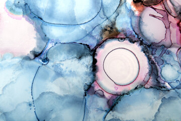 Ink stain art background in purple and blue