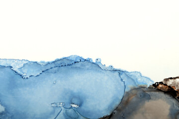 Ink stain art background in purple and blue