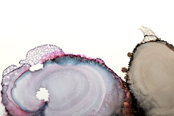 Ink stain art background in purple and blue