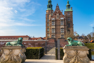 Bronze lion statues at the entrance gate of Rosenborg Castle in Copenhagen, Denmark