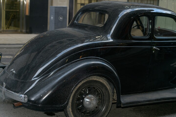 Fototapeta premium vintage automobile on a film set along Bay St, Toronto