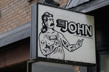 Fototapeta premium vintage ghost sign of The John: On Bloor - Craft Beer and Bistro once located at 1174 Bloor St W, Toronto