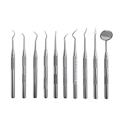 A set of stainless steel dental instruments displayed vertically against a black background.