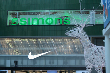 Fototapeta premium interior view of Simons dept store and Nike signs - The Eaton Center 220 Yonge St, Toronto