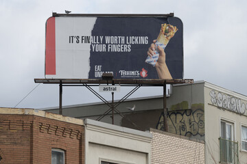 Fototapeta premium rooftop billboard for Tahini’s, a Middle Eastern restaurant, located near 890 Bloor St W, Toronto