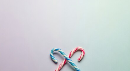 Fototapeta premium Charming Candy Canes Against A Pastel Gradient Background