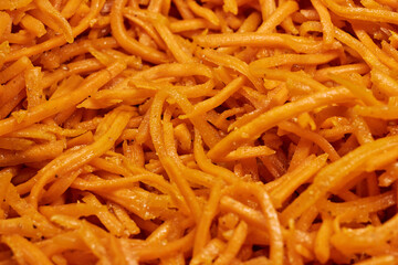 Close-Up of Spicy Korean Carrot Salad &ndash; Fresh Shredded Carrots with Seasoning