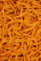 Close-Up of Spicy Korean Carrot Salad &ndash; Fresh Shredded Carrots with Seasoning