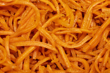 Close-Up of Spicy Korean Carrot Salad &ndash; Fresh Shredded Carrots with Seasoning